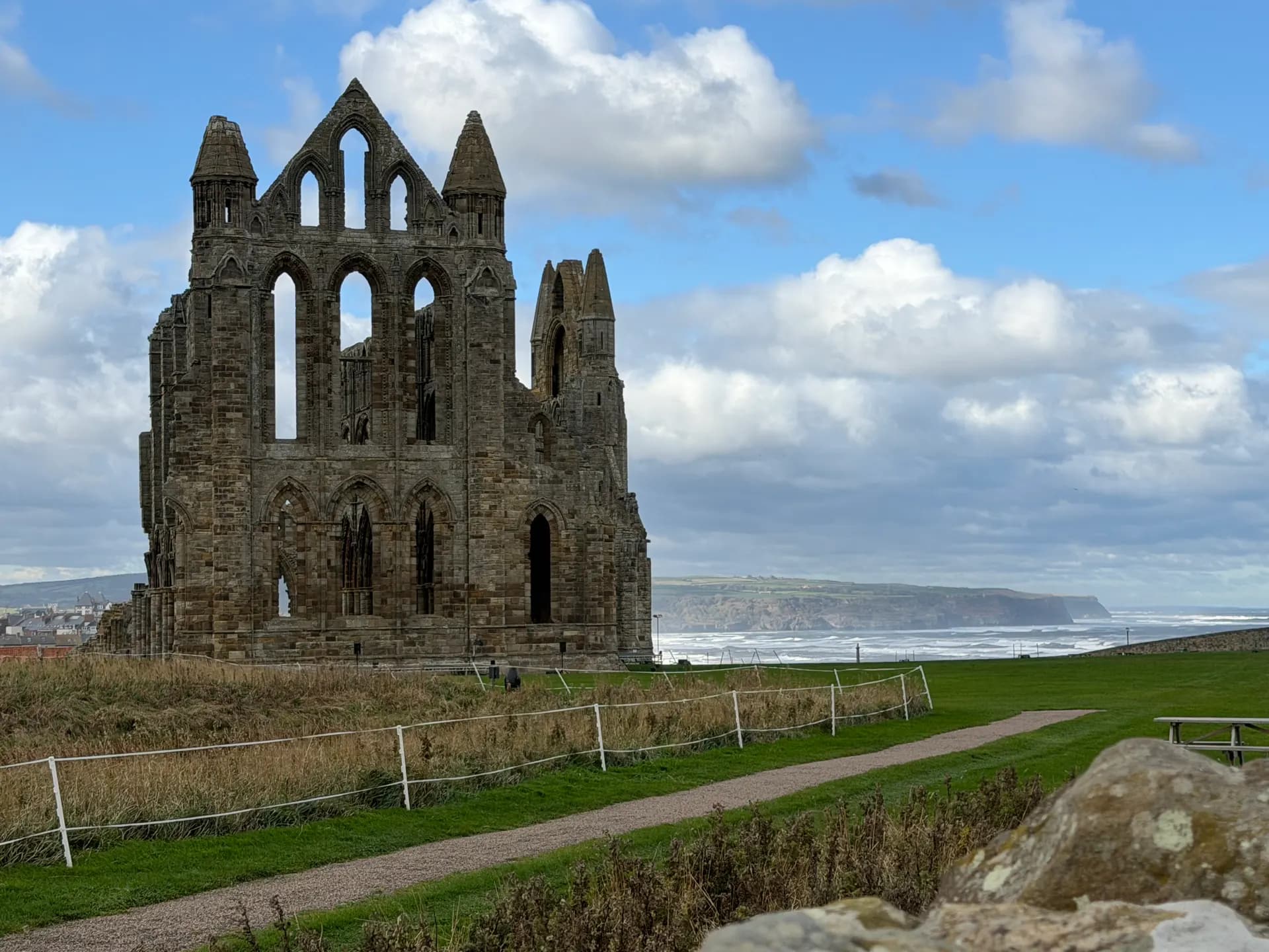 Whitby Abbey with the North Sea and cliffs beyond